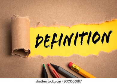 DEFINITION. Torn cardboard on a yellow background. - Shutterstock ID 2003556887
