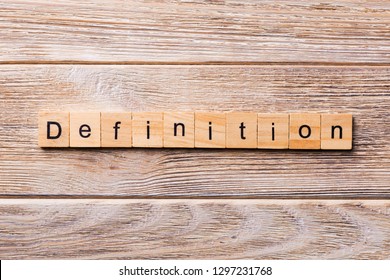 Definition word written on wood block. Definition text on wooden table for your desing, concept. - Shutterstock ID 1297231768