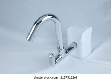 Definitions Of Water Tap. A Faucet For Drawing Water From A Pipe Or Cask. Synonyms: Hydrant, Tap, Water Faucet. Type Of: Faucet, Spigot. A Regulator For Controlling The Flow Of A Liquid From A Reserv