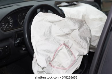 deflated airbags after the erupted inflation due to a car collision