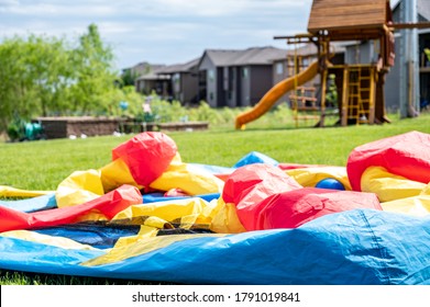 Deflated Bouncy House In Backyard