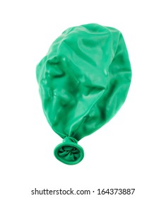 Deflated Green Balloon Isolated Over White Background