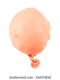 Deflated Pink Balloon Isolated Over White Background