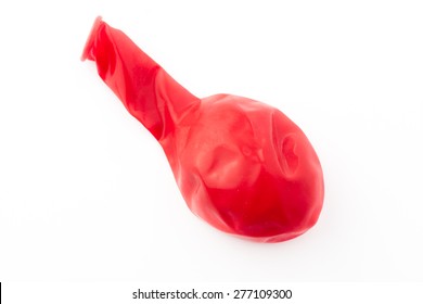 Deflated Red Baloon Isolated On White Background