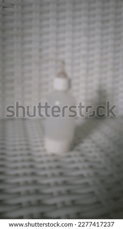 Defocus abstract background of shadow  milk bottle kitten which almost finish