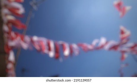 defocus abstract background small red   white pennant banner