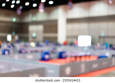 Defocus Blur Background Of Table Tennis Tournament Competition In An Indoor Stadium.