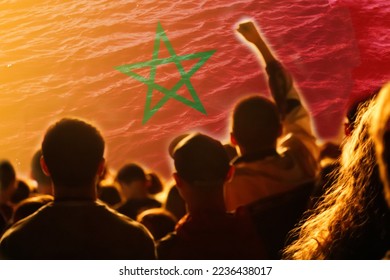 Defocus Morocco football team. supporters on stadium. Morocco flag and football fans celebrating victory. Protest in Morocco. Rise hand. Out of focus. - Shutterstock ID 2236438017