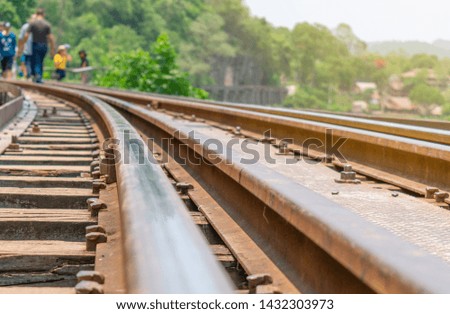 De-focus of people are walking on railway