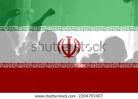 Defocus protest in Iran. Conflict war over border. Fire, flame. Country flag. Woman low rights. Male hands. Out of focus.