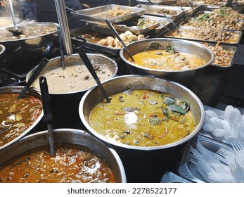 Defocus of Ready-to-eat food is sold in the market in the morning. commonly seen in the market of Thailand. Food in various containers ready for sale. - Shutterstock ID 2278522177