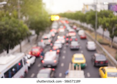 defocus rush hour traffic jam in ratchayothin,bangkok,thailand