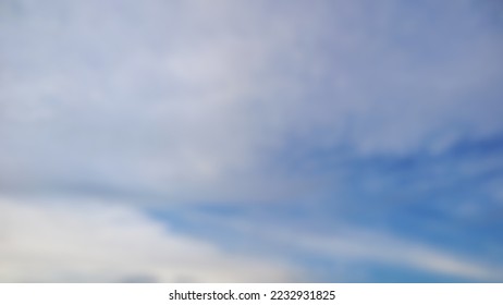 Defocus of summer blue sky with some clouds. - Shutterstock ID 2232931825
