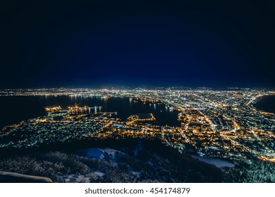 Defocus Winter Night View of Hakodate harbor from Mount Hakodate, must see sightseeing, Hokkaido, Japan - Powered by Shutterstock