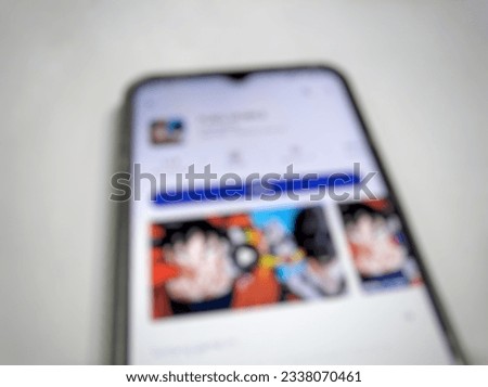 Defocused abstract background of an app on the Android PlayStore white background shot in the studio.