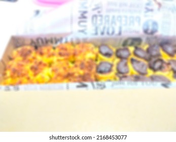 Defocused Abstract Background Of Banana Cream Cake And Chocolate Cream.