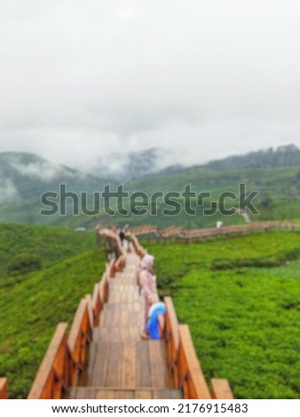 defocused abstract background of bridge, tea plantations, and mountanins at pangalengan village