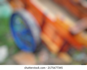 Defocused Abstract Background Of Building Material Transport Cart