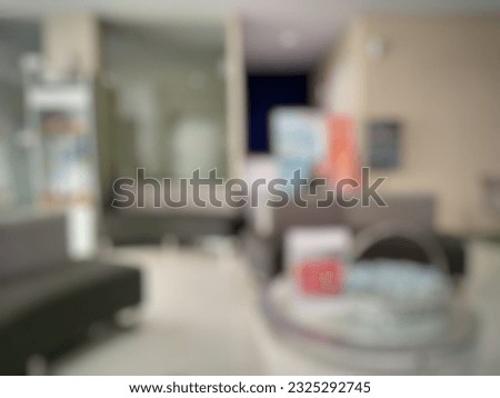 Defocused abstract background of comfortable and representative waiting room at Grapari Telkomsel Purwokerto Office