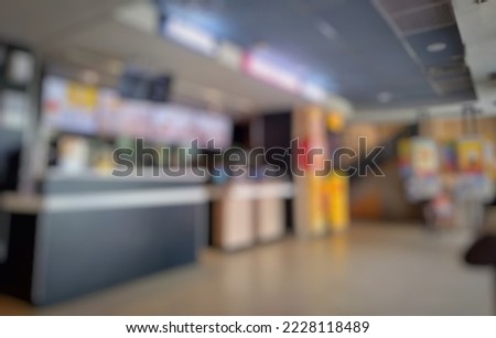 Defocused abstract background empty Fast food restaurant counter  inside modern shopping mall or shopping center. 
