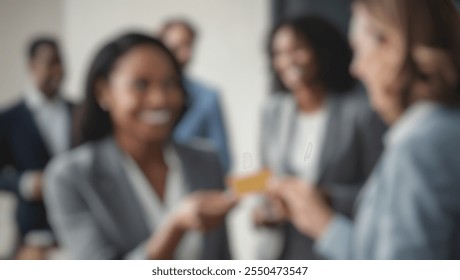 Defocused abstract background featuring a confident woman passing a business card in a friendly setting, emphasizing professional and relaxed vibes. - Powered by Shutterstock