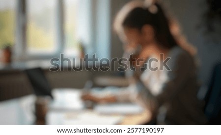 Defocused abstract background featuring a reflective woman writing, ideal for mindfulness, self-care, and productivity-related visuals.