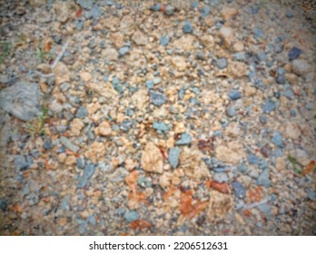 Defocused Abstract Background Of Gravel Rocky Ground