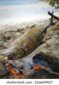 Defocused Abstract Background Of Grilled Fish By The Beach