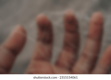 Defocused abstract background of hand - Shutterstock ID 2315154061