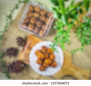 Defocused Abstract Background Of Palm Sugar Cookies With Leaf And Wooden Tray Decoration