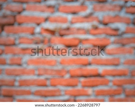 Defocused abstract background of Rectangular red bricks