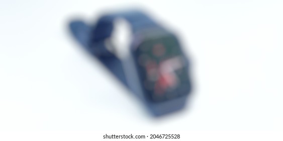 Defocused abstract background of Smartwatch with black strap and elegant watchface