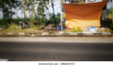 Defocused Abstract Background Of Street Durian Seller.