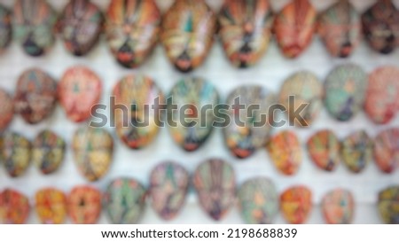 Defocused Abstract Background of traditional Indonesian wooden masks