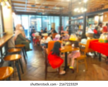 Defocused Abstract Background Of A Unique Coffee Shop At Night