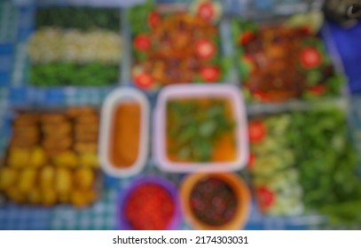 Defocused Abstract Background Of Variety Of Food Prepared For Family Dinner.