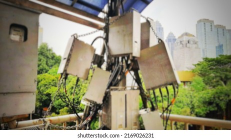 Defocused Abstract Background Of A View Of The Electrical Wiring Installation, Located On A Busway Pedestrian Bridge, In The City Of Jakarta, Indonesia.