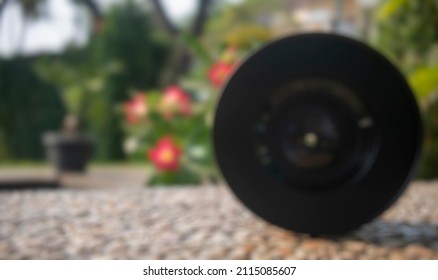 Defocused Abstract Background Of Vintage Camera Lens Close Up Shot With Nature Background