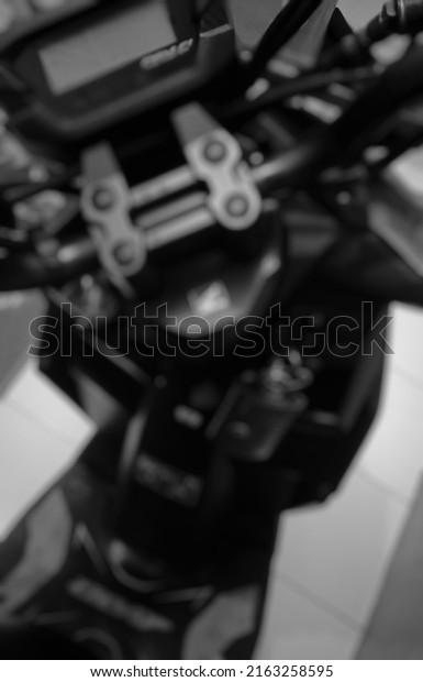 defocused abstract beckground of motorcycle lock\
with black and white\
theme