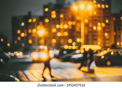 Defocused Abstract Boke Bokeh Urban City Background Effect. Blurred Design Backdrop In Trend 2021 Colors Yellow And Gray Grey. City Circle Street Defocused Lights Glowing In Night. Pedestrian Crossing