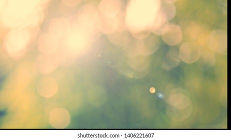 Defocused Abstract Nature Background Yellow Leaves And Bokeh Lights. Royalty High-quality Free Stock Image Of Natural Blurred Bokeh Background From Leaf With Copyspace For Text Advertising Design