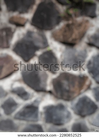 Defocused abstract object of rockstone wall texture