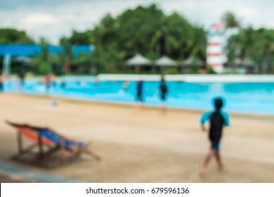 Defocused Artificial Sea And Kid Is Running To Sea