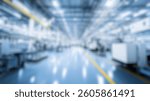 Defocused Background of Bright and Spacious Industrial Factory Interior with Modern Machinery and Organized Production Floor. Blurred Background Photo.