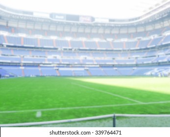 Defocused Background Of A Football Stadium. Intentionally Blurred Post Production For Bokeh Effect