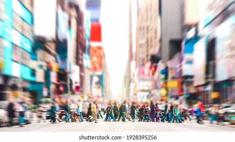 Defocused background of people walking on zebra crossing on 7th avenue in Manhattan - Crowded streets of New York City during rush hour in urban area - Vivid sunset filter with soft sharp focus - Shutterstock ID 1928395256