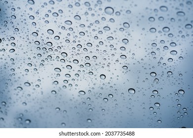 Defocused Background With Raindrop On Windshield