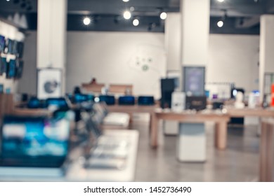 Defocused Background Of Real Shopping Mall, Gadget Store.