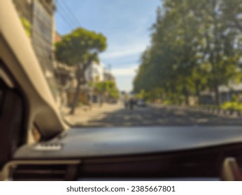 Defocused background of Traffic view from inside car