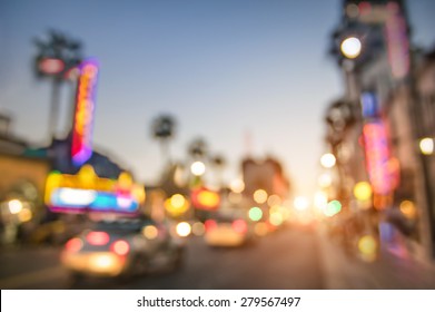 Defocused blur of Hollywood Boulevard at sunset - Bokeh abstract view of world famous Walk of Fame in California - United States of America wonders - Emotional saturated filter with powered sunshine
